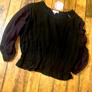 UMGEE NWT- black top.  Very flattering!!! Very versatile!!